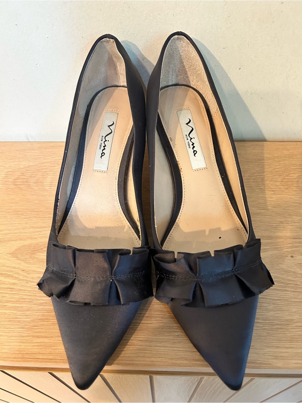 Nina Black Pointed-Toe Ruffle Pumps